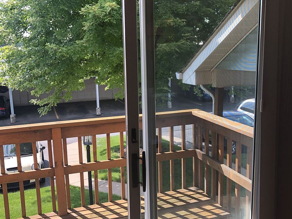 Door Wall off Living Room Leads to Lovely Deck