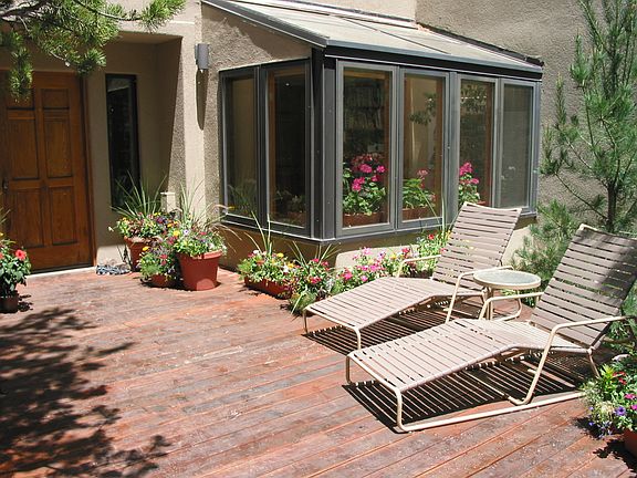 Front door and redwood deck