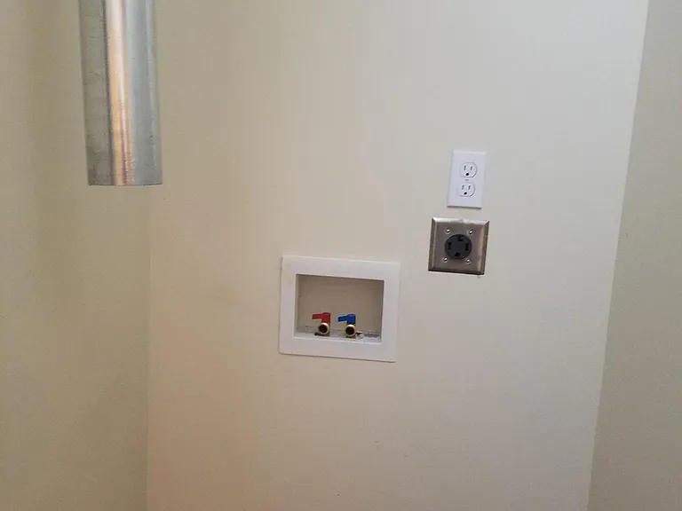 Washer/Dryer hook-up for stackable units