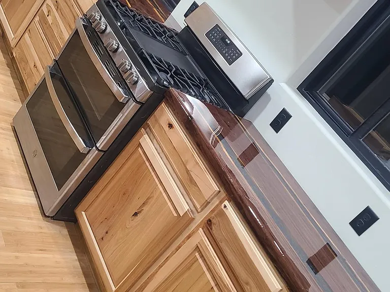 Counter tops with double oven and Gas stove.