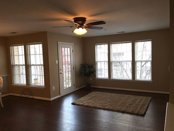 Ceiling fans throughout unit