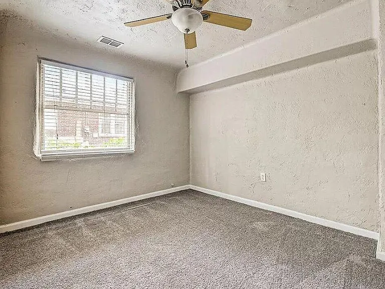 Side downstairs bedroom.