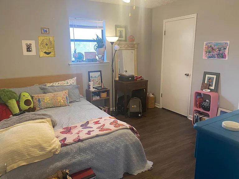 one of two bedrooms- both rooms have two large closets