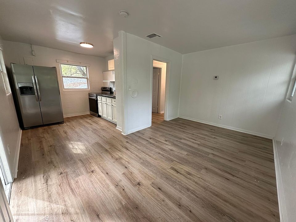 Living Room and Kitchen. Upgraded stainless steel appliances.