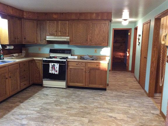 New flooring, wood cabinets