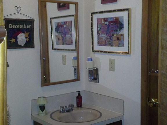 1/2 bath w/storage area