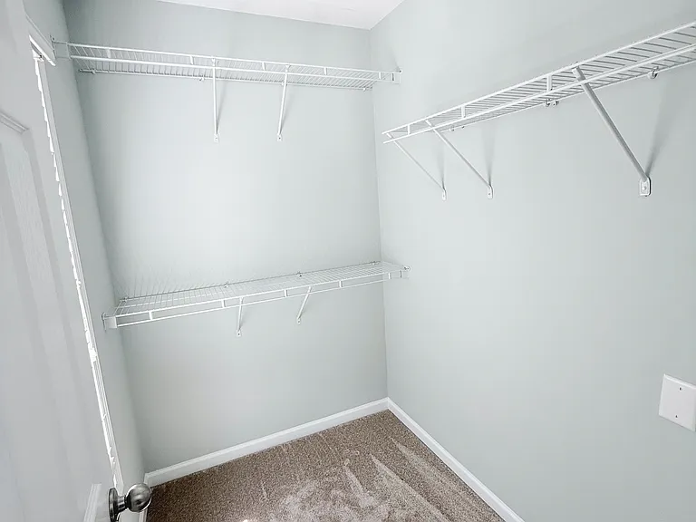 Main Bedroom Walk-in closet.
