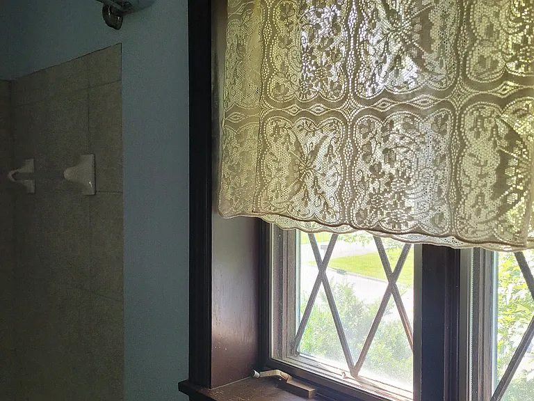 Master bath with tiled shower walls.