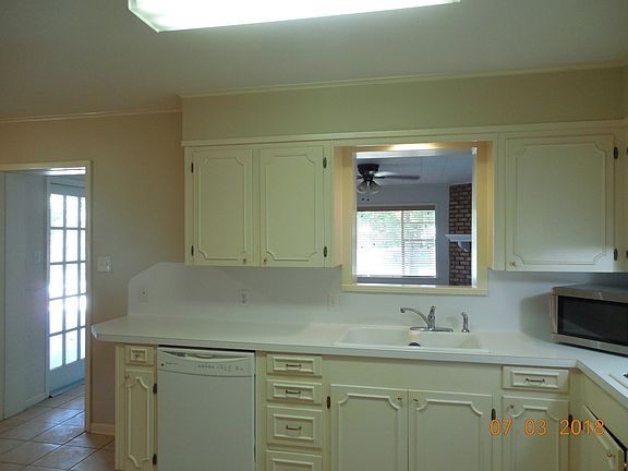 Kitchen w/ opening to Den