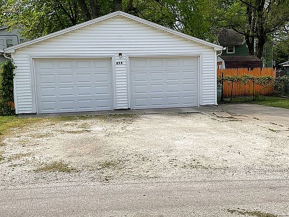 Alley view of garage 