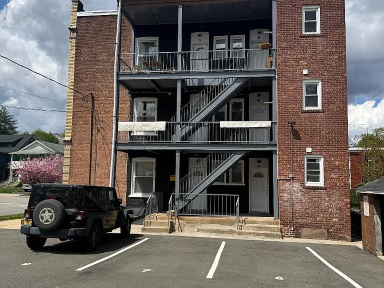 Back of the building with parking