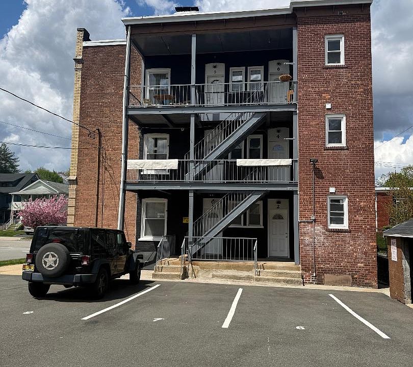 Back of the building with parking