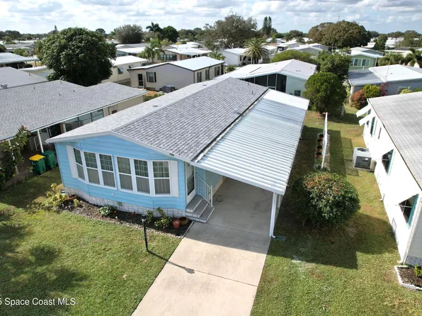 709 Periwinkle Cir, Barefoot Bay, FL 32976