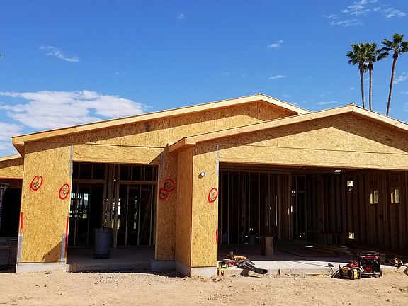 Street view. 3 car garage