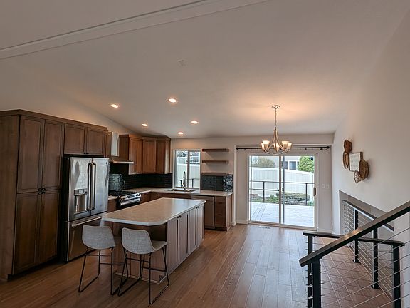 Kitchen and Island.
Tile Backsplash
Gas Stove
