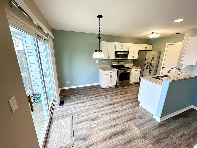 Kitchen with room for a 4 person table