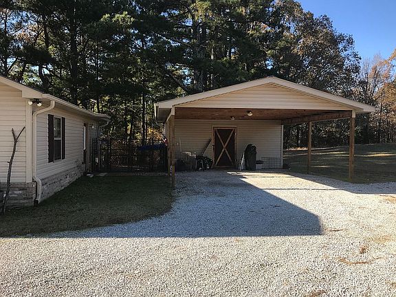 Carport & gravel drive