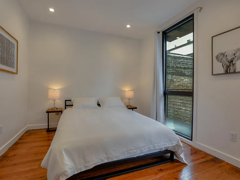 There are two guest bedrooms and a full bathroom on the second floor of the condo.