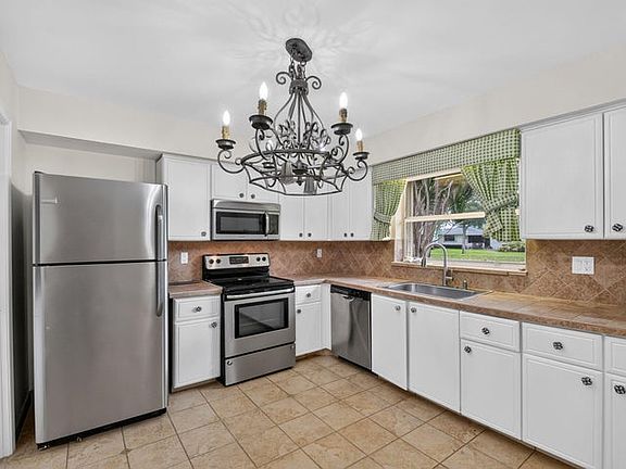 3rd image of 9930 Frangipani Tree Way
