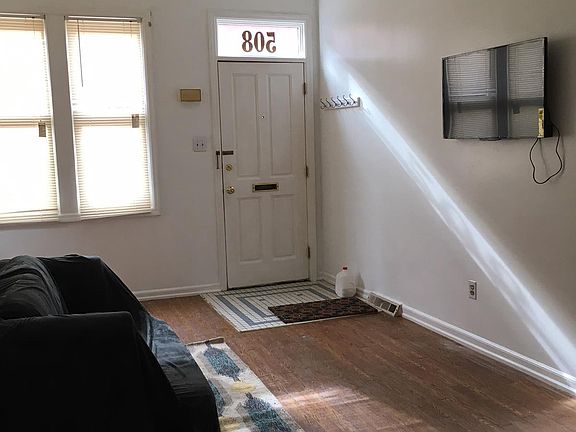 Enter to an open living room dining room space