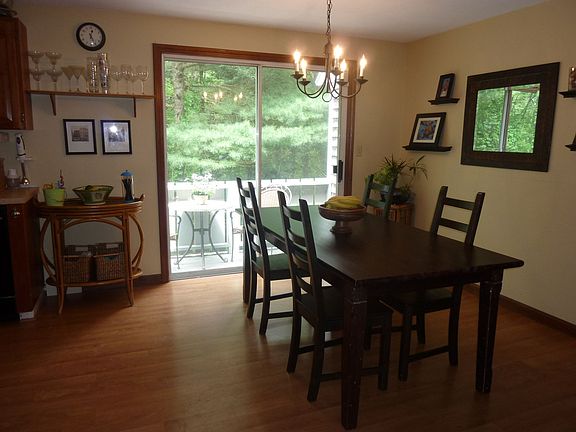 Dining area with sliders to upper balcony