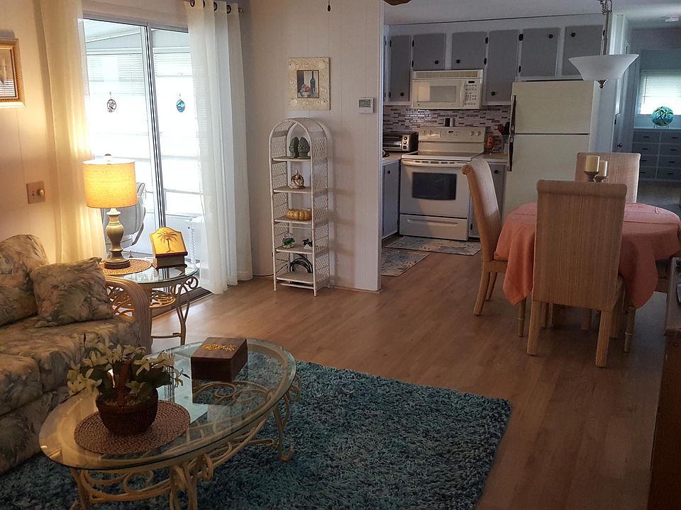 Undated Kitchen Bright and Open with new laminate floors thr