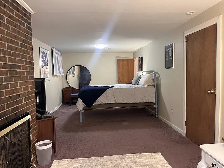 Full size bed with Medium pillow top mattress, two different pillow options (both hypoallergenic), TV with cable and DVD player and vintage vanity