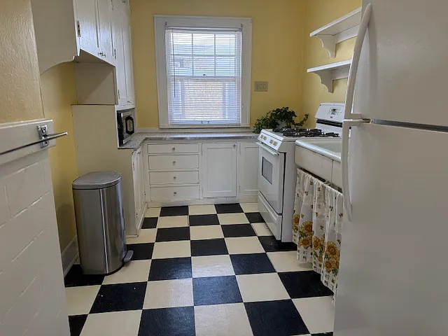 Freshly painted with newer refrigerator.