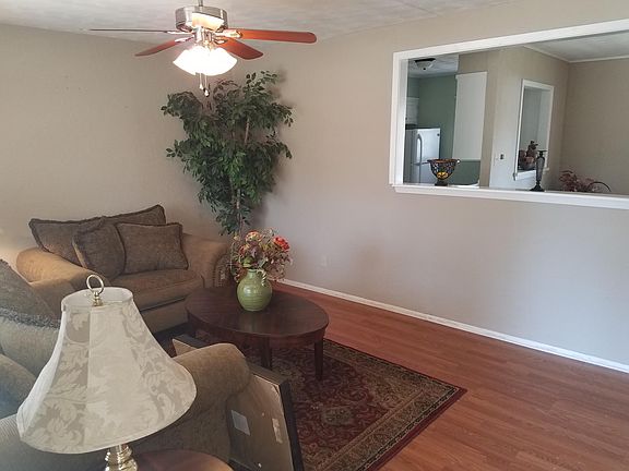 Living Room open to Dining Room and Kitchen