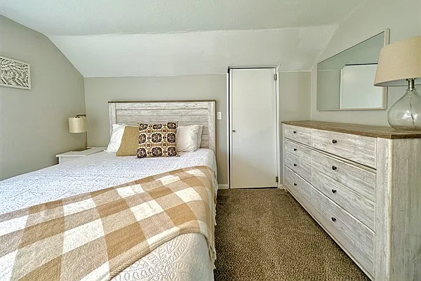 Upstairs primary bedroom queen bed