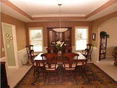 Formal Dining Room with Picture Framing and Chair Rail