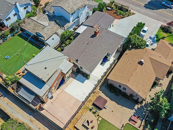 The rental is the 2 story house on left. Two private patios.