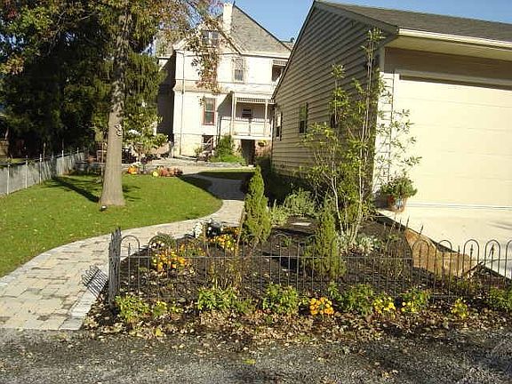 Walkway past the 6 bay garage