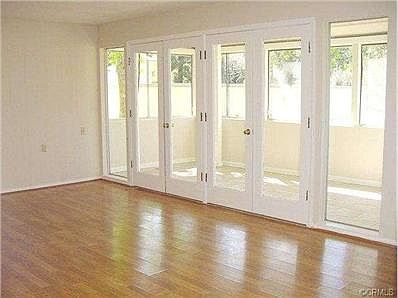 Another View to Patio off Living Room, Laminate Flooring