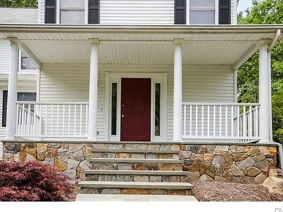 Columned Front Porch Welcomes Friends and Family