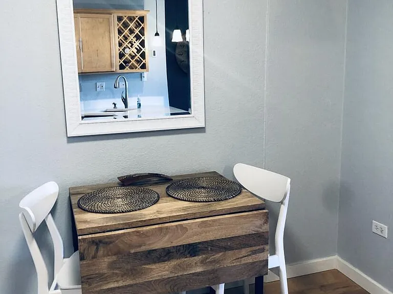 Modern dining area with table that expands to see up to 4.