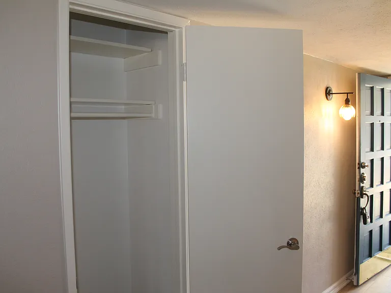 The entryway closet provides a perfect spot to tuck away everyday essentials