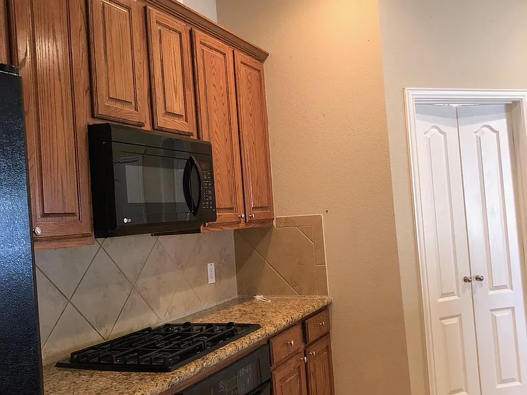 Kitchen with granite counter top