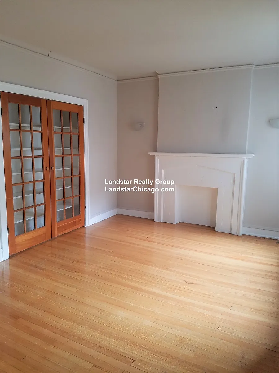 Building Photo - 1321.5 W Estes Ave #34
