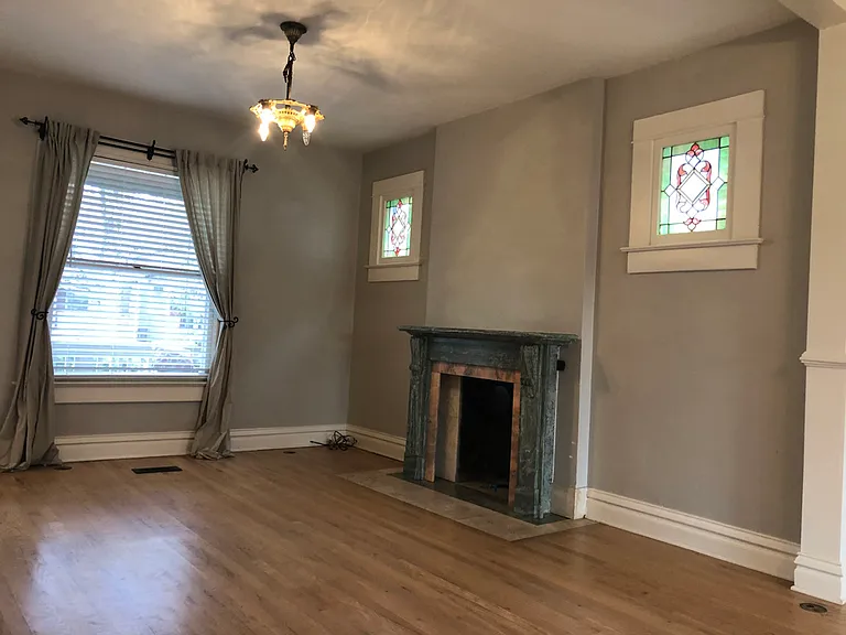 Non working fireplace and stain glass