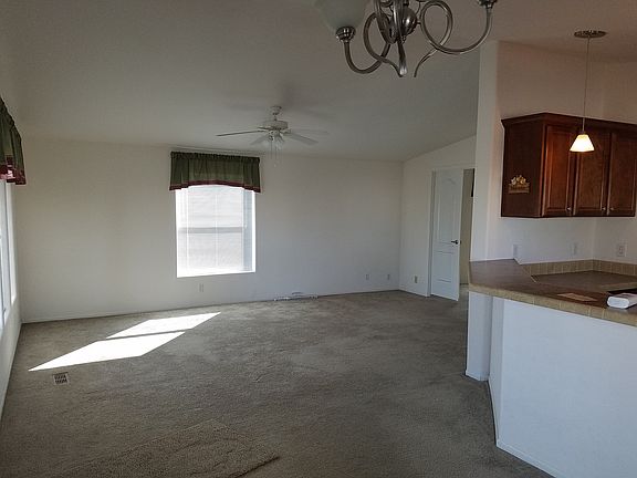 4th image of 13827 E 49th Ln