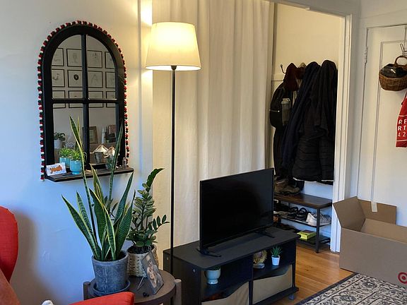 Living room next to walk in closet