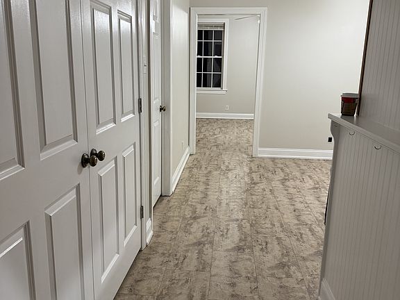after walking in front door. Washer drier to left, along with storage closet and basement entrance