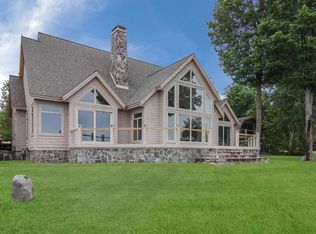 11411 SW Torch Lake Dr, Rapid City, MI 49676