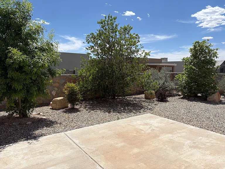 The concrete patio is perfect for outdoor dining and a bbq.