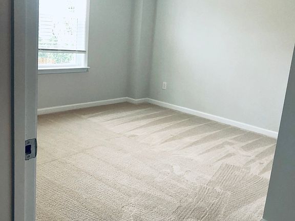 Main Floor Guest Suite (currently being used as WFH office - nature view - custom closet)