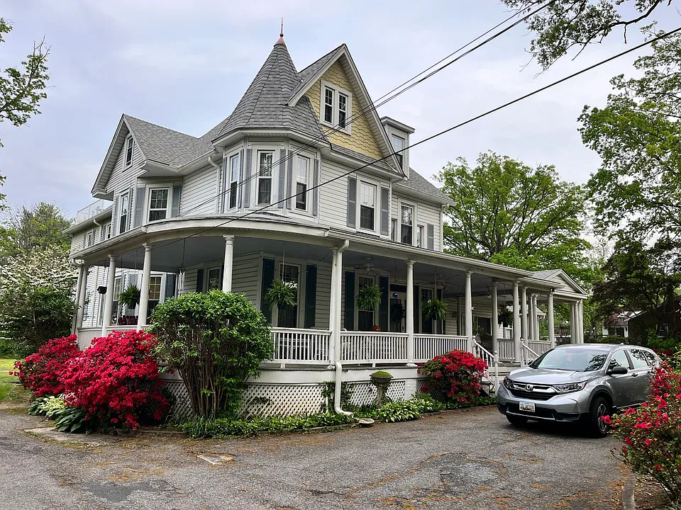 front view of house. apt is located on the top floor