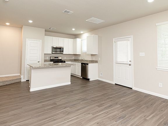 Family Room to Dining Area and Kitchen