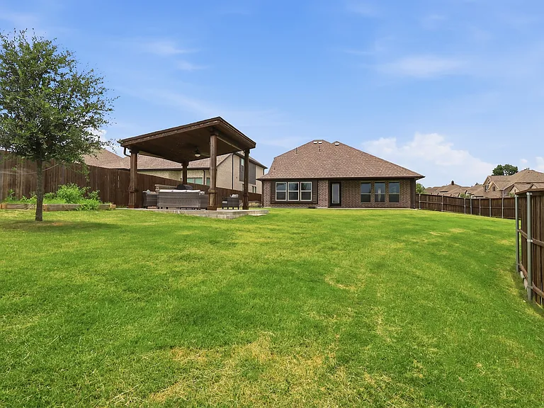 Huge Backyard with Custom Outdoor Pavilion and a Covered Backyard Patio