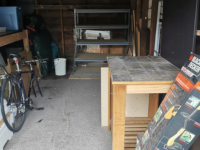 Lockable storage she'd behind the house